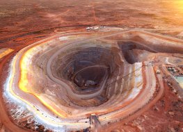 Aerial shot of an open pit gold mine 