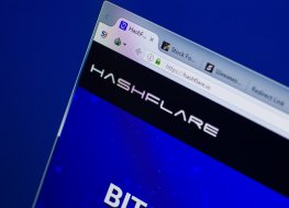 The HashFlare website URL is displayed on a computer screen