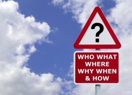 Questions signposts The big questions highlighted on a signpost with a blue sky