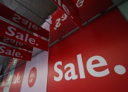 Retailers sales signs on London high street. Photo Getty Retailers sales signs on London high street. Photo Getty