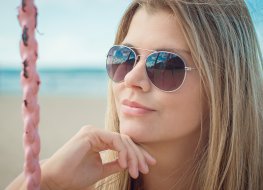 Ray-Ban sunglasses Young woman wearing Ray-Ban sunglasses