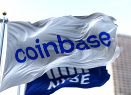 Flags flying in the wind with Coinbase and NYSE logos