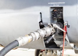 Fuel being pumped into a jet aircraft