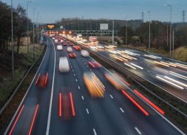 Fast-moving traffic drives along the M42 in Warwickshire during evening rush hour