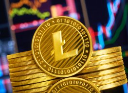 Representation of a pile of golden litecoin cryptocurrency tokens