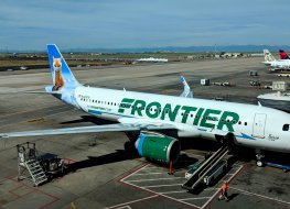 Frontier jet on the tarmac at an airport