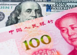 100 Yuan renminbi banknote and 100 dollar banknote 