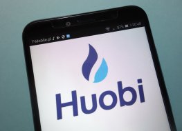 Huobi cryptocurrency exchange logo on smartphone