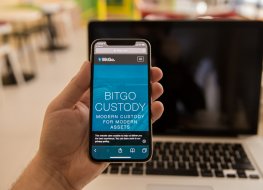 A smartphone displays the BitGo name