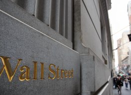 Wall Street signs on a building