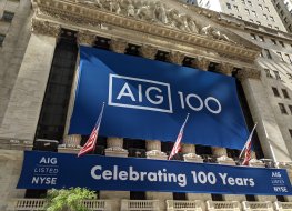 A image of the AIG sign outside of the New York Stock Exchange