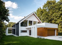 Exterior of modern house in white with a garage 