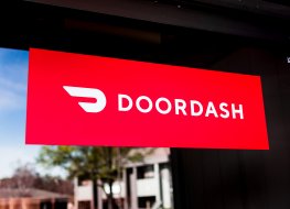 Feb 27, 2020 Santa Clara / CA / USA - Close up of Doordash logo and symbol displayed at the entrance to one of their offices; DoorDash Inc. is a on-demand prepared food delivery service