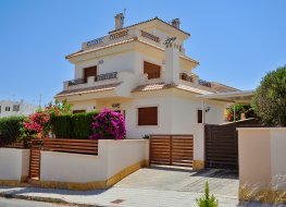 Canarian style houses in the resort town of Orihuela, La Zenia, Spain.