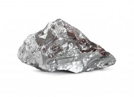 A lump of nickel ore on a white background