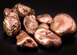 Copper nuggets on a black background