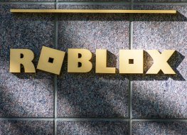 Roblox sign logo at headquarters. Roblox is an online gaming platform and game creation system - San Mateo, California, USA - 2020
