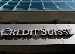 Credit Suisse Bank sign hanging in front of the building in Lugano