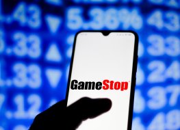 GameStop short squeeze: GME interest and positions growing again despite NFT launch In this photo illustration the GameStop logo seen displayed on a smartphone screen