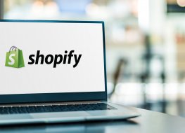 Laptop computer displaying Shopify logo