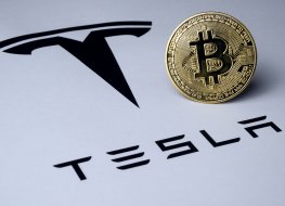 Tesla logo and bitcoin