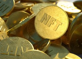 NFT golden coins in pile. Non fungible tokens dropped casually in a large pile, close-up shot. Embossed circuit design, shiny gold color with bright sunlight. Trendy cryptocurrency art coins.