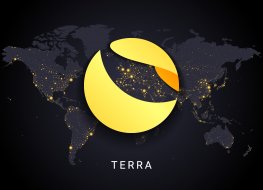 Terra crypto currency digital payment system blockchain concept. Cryptocurrency isolated on earth night lights world map background.