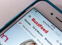 BuzzFeed A BuzzFeed window appears on a cell phone