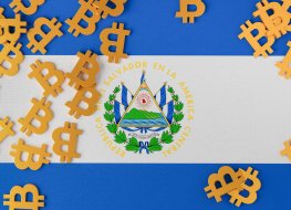 Blue and white El Salvador flag scattered with bitcoin symbols