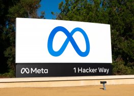 Meta logo in front of Facebook headquarters