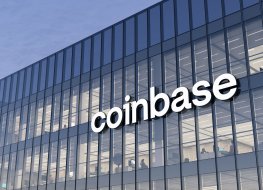 coinbase Signage Logo on Top of Glass Building. 