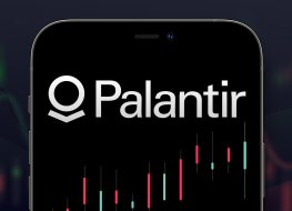 NY - 26 November 2021: Palantir logo in a smartphone with a series of stock charts on the background.