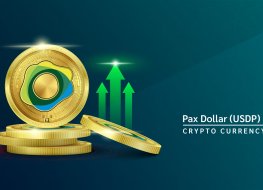 Pax gold logo on a gold coin with bullish and bearish signals