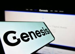 The Genesis logo appears on a smartphone