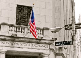 American flag flying on Wall Street 