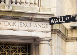 Wall Street sign on stock exchange building