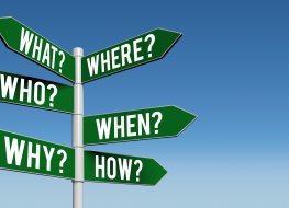 Questions signposts The big questions highlighted on a signpost with a blue sky
