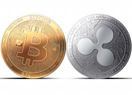 Clash of Bitcoin and Ripple (XRP) coins isolated on white background with copy space.