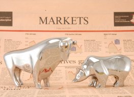 A financial newspaper with bulls and bears image.