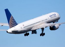 Photo of a United Airlines passenger jet in flight 