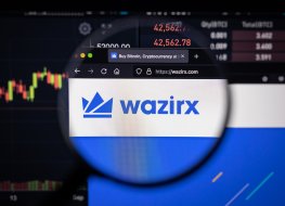 WazirX's website in front of a price chart