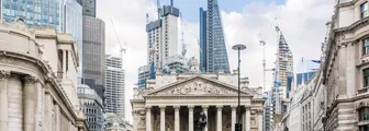 Street in City of London with Royal Exchange, Bank of England and new mode skyscrapers