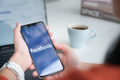 Facebook logo on a smartphone