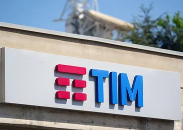TIM logo displayed on the exterior of a telecommunications company building