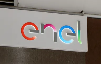Enel logo sign mounted on a wall