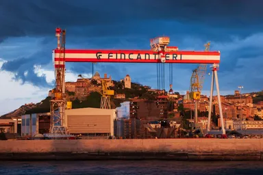 Fincantieri shipyard with cranes and industrial infrastructure