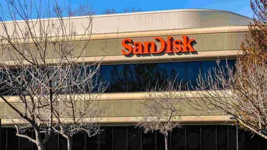 SanDisk logo displayed on the exterior of a company office building, representing the flash memory and data storage technology manufacturer.