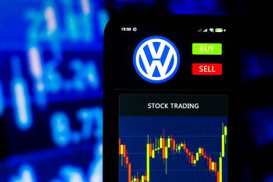 Volkswagen logo and a stock chart