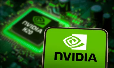 Nvidia logo displayed on a smartphone in front of an Nvidia-branded computer chip