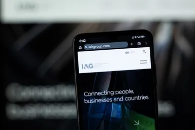 International Airlines Group (IAG) website displayed on a smartphone